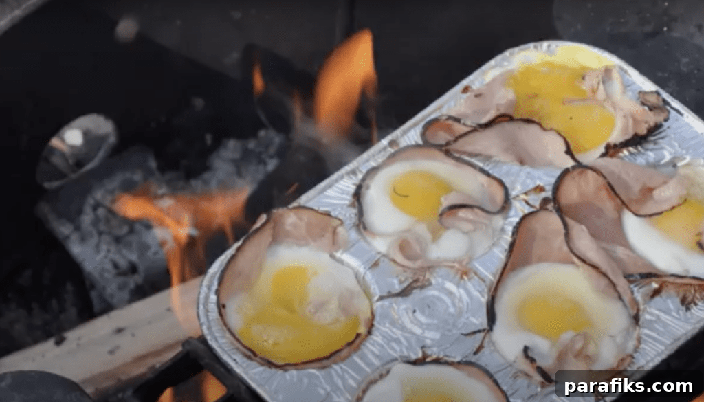 Campfire egg cups with ham