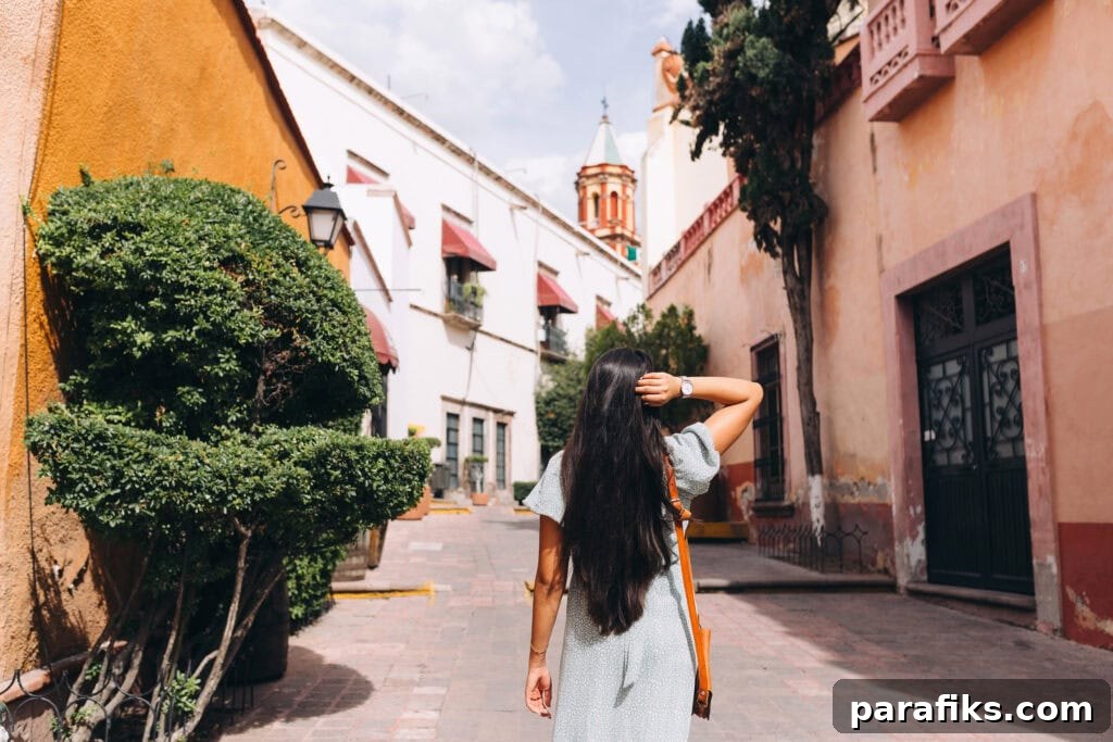 30 Freelance and Self-Employed Jobs That Let You Be Your Own Boss 5 picture of woman walking down touristy street. I want to be my own boss what can I do
