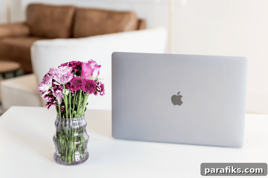 Make Money on Fiverr: A Beginner’s Step-by-Step Guide 3 laptop and purple flowers on a desk - How to make money on Fiverr without skills