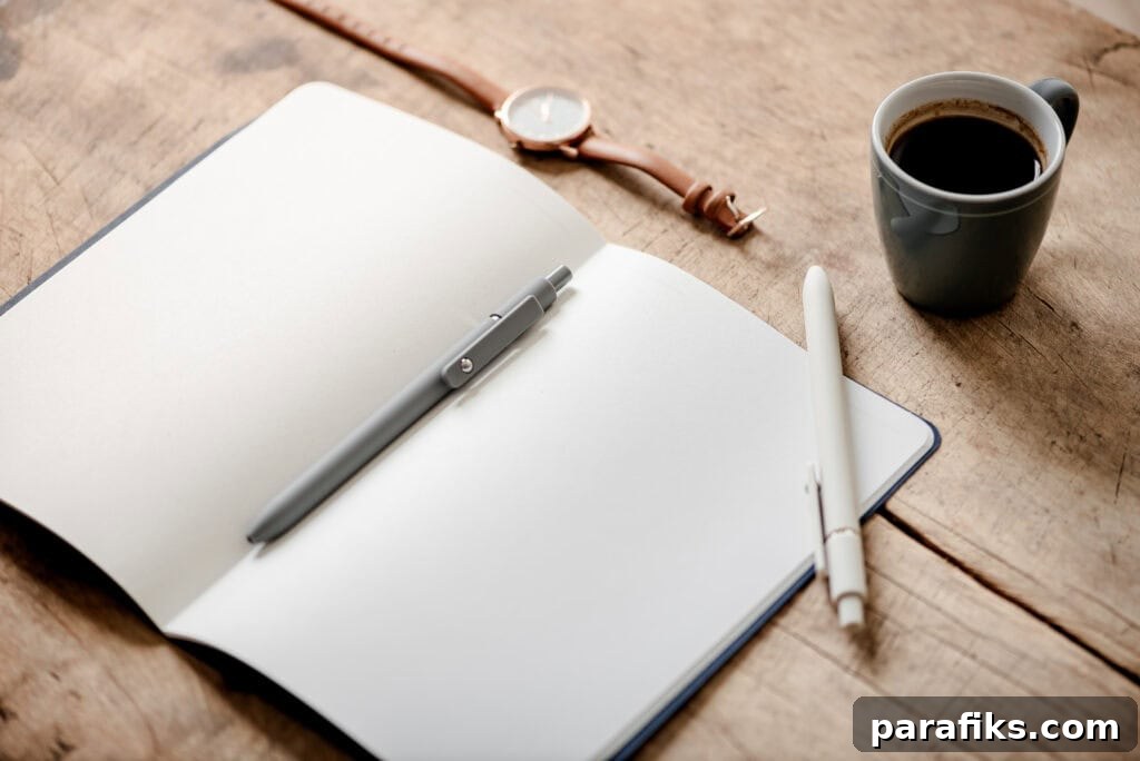 23 Practical Ways to Save More Money Starting Today 3 journal on table with coffee and watch - money saving hacks that work