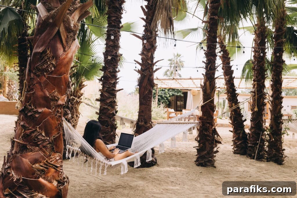 16 Real Ways to Earn $10,000 a Month 2 woman working on laptop on hammock - how to make $10,000 a month