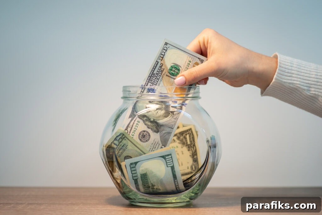 14 Low-Cost Side Hustles You Can Start With Zero Investment 2 hand putting money into glass jar for article side hustles you can start with no money