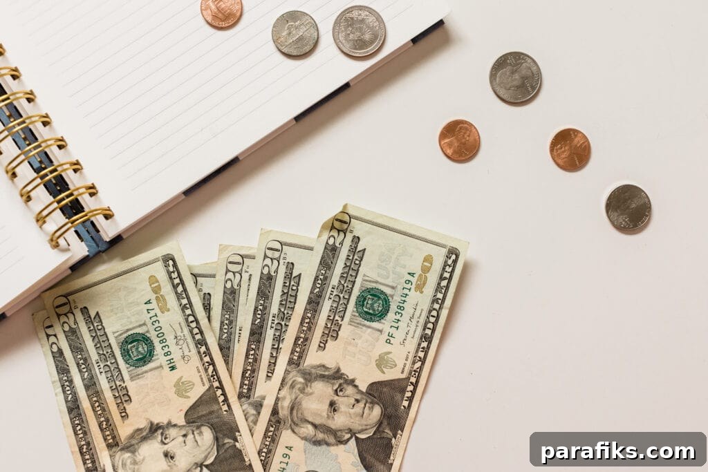 picture of money and journal on table for article how to decide what business to start