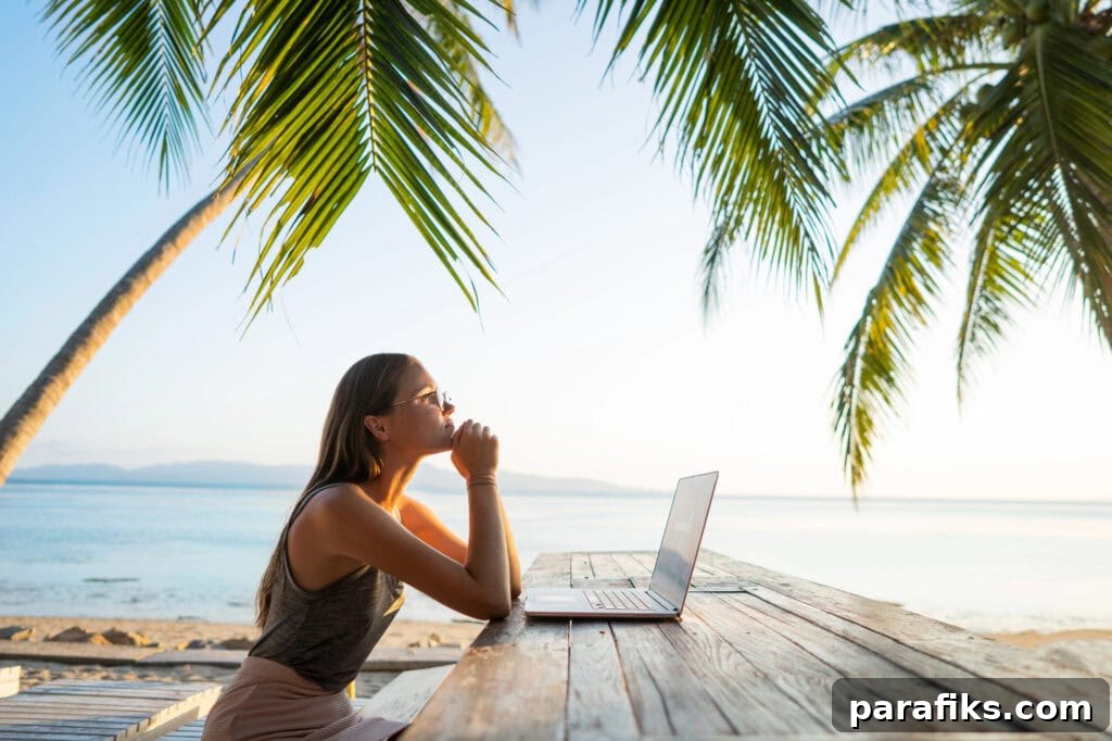 woman thinking and on her laptop for article How to choose a business idea to start