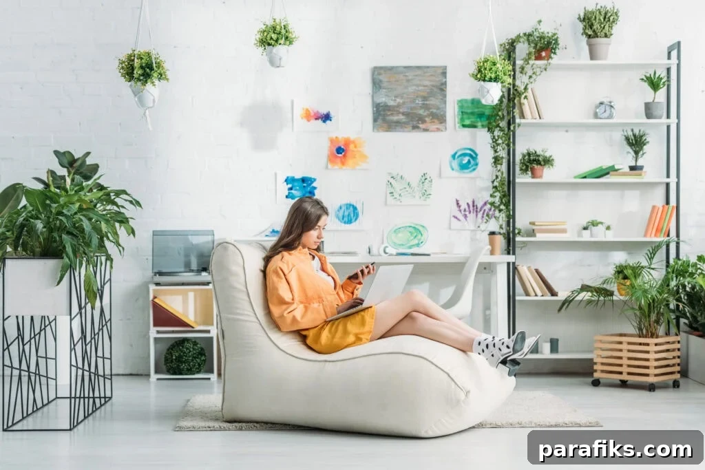 woman sitting on couch working - how to make $3,000 a month