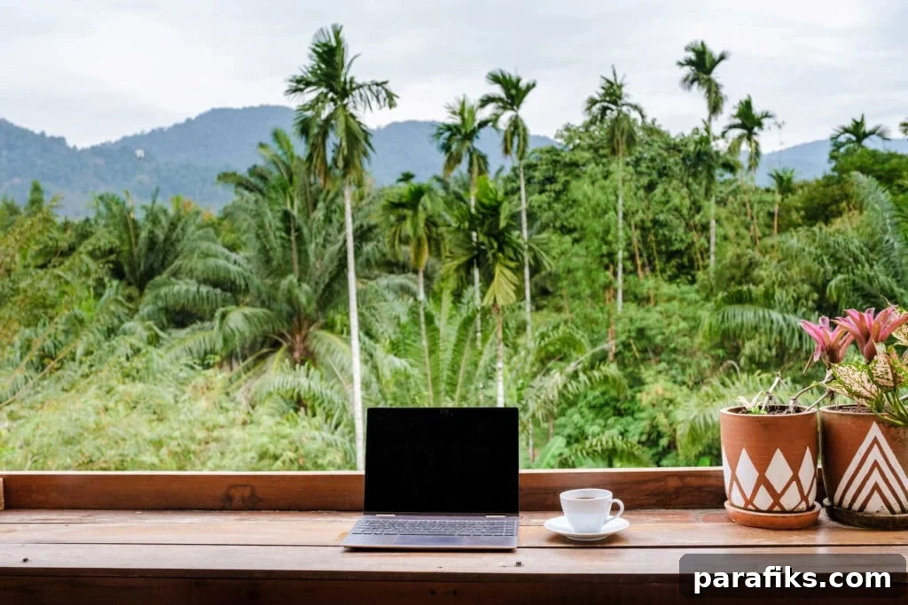 How to Earn $15,000 a Month: 15 Proven Income Strategies 3 laptop on table in front of jungle for article best ways to make $15,000 a month on a laptop